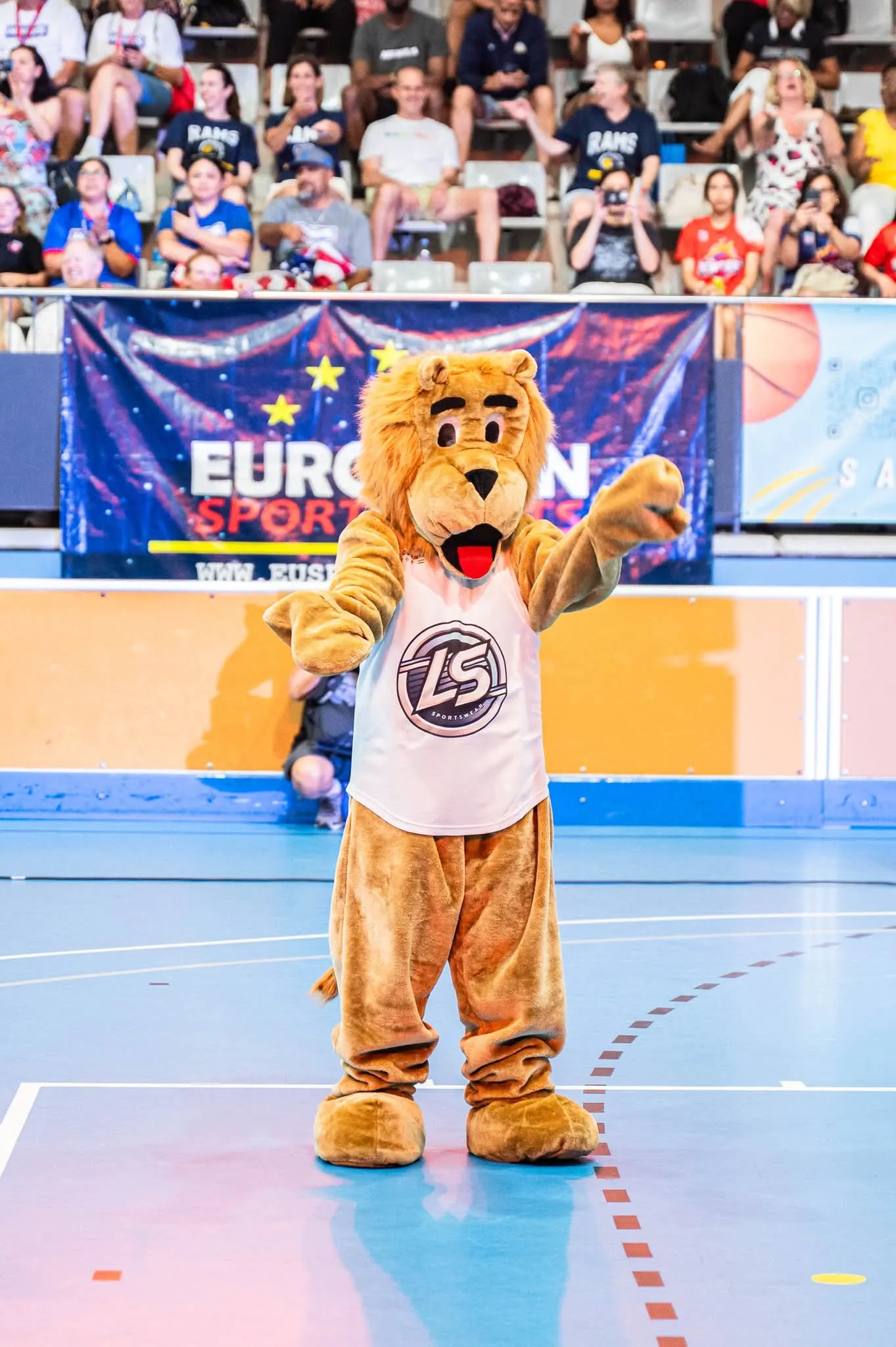 The tournament mascot on court in front of the European Sport Events banner