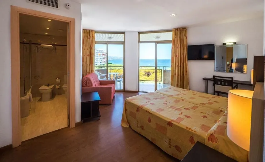 A room at one of the four-star hotels, looking out to the sea