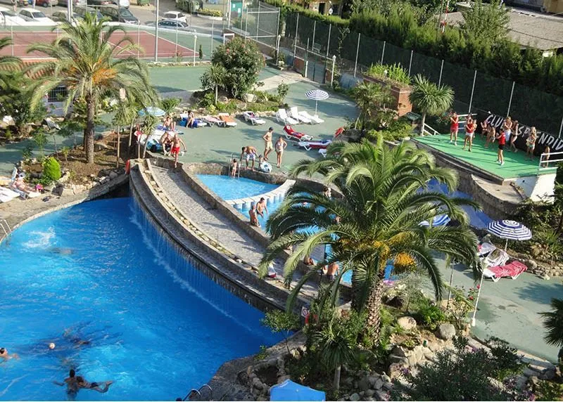 The pool and terrace at one of the hotels used by the tournament
