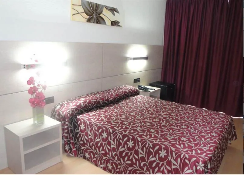 A bedroom at one of the hotels
